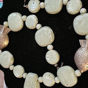 Heather Outlaw Designs light green and silver fish .